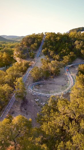 First Alpine Coaster In Texas - The Cliff Carver is located at Camp Fimfo Texas Hill Country in New Braunfels, TX!🎢 The gravity-propelled sleds allows you to manually break so you can control your speed. It goes up to 25mph which feels even faster at certain points when you’re weaving through the trees and hitting heavy turns. Let’s not forget the incredible Hill Country views! #alpinecoaster #campfimfo #newbraunfels #newbraunfelstx #texas #tx #texashillcountry #txhillcountry #texascountry #nat