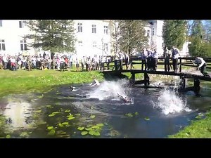 Wetlook, the girls in school uniforms jump into the water, fully clothed, green skirts