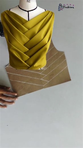 Noor fashion on Instagram: "✨ Criss-Cross Draped Pattern ✨ Overlap Pleated Drape Design ya ✨ Wrap Style Pleated Blouse Pattern Fashion & tailoring language mein isse 👉 Draped Wrap Blouse 👉 Cross Front Pleats #trending #stitching #cutting #fashion #crisscrosspattern #sewing #Drapedwarpblouse , #clothings ##clothingbrand"