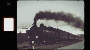 A Vintage Steam Train Moving Swiftly Along Rails A Timeless Classic Transportation Scene