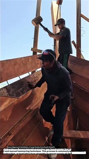 Manual Alignment & Installation of Large Wooden Form Panels Using Chain Hoist.