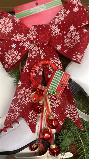 Who says Christmas decor has to be expensive? Here's how I created a festive holiday wreath for $12 using thrifted ice skates, some tree branches, and a few dollar-store supplies! Cute and beautiful! #salvagedinspirations #diy #homedecor #holidays #christmasdecor #thriftdecor #upcycling | Salvaged Inspirations