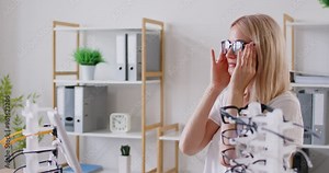 Woman finding, choosing right pair of glasses, perfect correct optical frame, lens at optician, eye care of doctor, visiting ophthalmologist in medical clinic to correct vision, selecting in shop