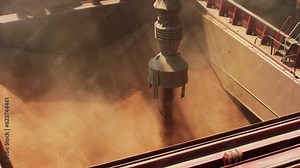 Grain loading to bulker ship cargo container at sea grain terminal in seaport. Wheat shipment from silos to bulk vessel via trunk at sea port. Transportation of agricultural harvest commodities.