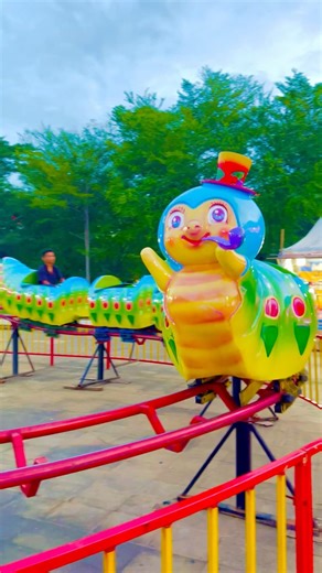 😍🐛 Riding the caterpillar train = instant happiness! #shorts