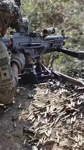 U.S. Army soldier conducting a live-fire machine gun exercise