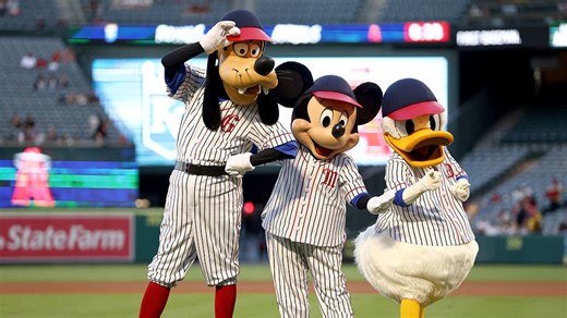 Mickey, Donald and Goofy throw out first pitch