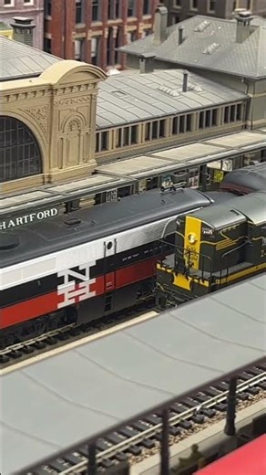 HO Scale New Haven Railroad freight train OB-2 running past New Haven Union Station