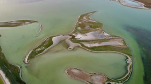 Abstracts islands in a beautiful lake, aerial - Free Stock Video