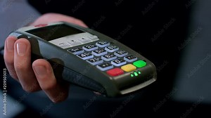 Pos terminal payment. Human hand swipe credit card in payment terminal. Credit card machine for money transaction. Easy shopping service. Card pay