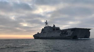US Navy warship 'brazenly buzzed' by UFOs in video taken by sailors on deck