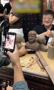 975K views · 10K reactions | Clay sculptures are a national intangible cultural heritage. This craftsman has been making statues on this street for 20 years. This customer was amazed at how realistic the clay sculpture version of him was. #Heritage #FunChina #artwork #creative #FunChina | China Plus Culture | Facebook