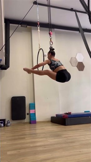 Performer is hanging by her hair and spinning!