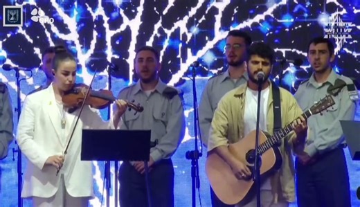 Daniel Weiss, a survivor of the massacre in Kibbutz Be'eri, who lost both his parents in the October 7th Massacre, performed the song "Shir L'Maalot - A Song for Ascents" at the Auschwitz-Birkenau death camp at the conclusion of the March of the Living. He was accompanied on the violin by Agam Berger, who was abducted from the Nahal Oz base and was returned to Israel after 482 days in Hamas captivity. Berger used a 130-year-old violin that survived the Holocaust. | Arutz Sheva - Israel National 