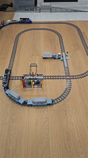 Perfect LEGO train timing on double-track intersection 🚆