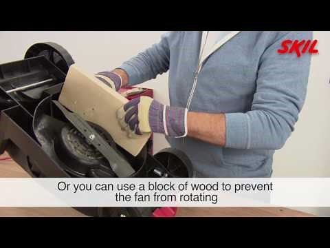 How to replace the cutting blade of an electric lawn mower?