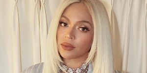 Beyoncé Put a Holiday Twist on the Classic Pinstripe Suit