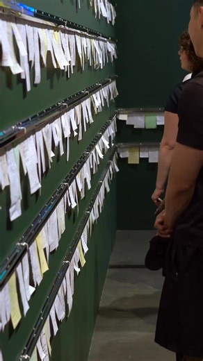 Step into Order Up: A City Fed by Many Cultures at the Immigration Museum and discover the stories behind Melbourne’s dining scene. Suspended above you are hundreds of handwritten, food-stained dockets from 33 iconic restaurants each one a memory of migration, resilience, and connection. Immerse yourself in the sounds, sights, and voices of kitchens that shaped our city. | Immigration Museum