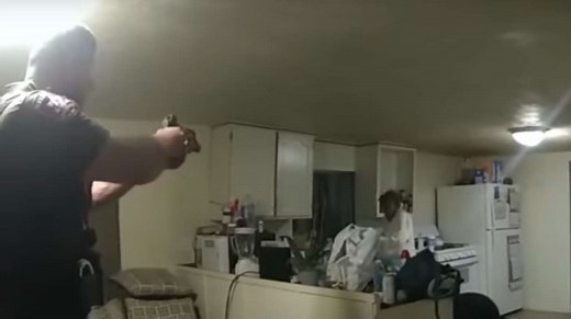 She 'came at me with boiling water,' a cop charged with murder claims, contradicting what video shows