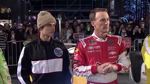 Jimmy Fallon, Justin Bieber, Jesse Tyler Ferguson and The Roots' Tariq (Black Thought) each pair up with a driver competing in the NASCAR Sprint Cup Series championship - Jeff Gordon, Kevin Harvick, Martin Truex Jr.. and Kyle Busch - to compete in a relay race through Rockefeller Plaza. | The Tonight Show Starring Jimmy Fallon