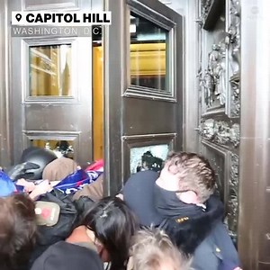 Dramatic video shows protesters attempting to pry open the door to the U.S. Capitol, as law enforcement struggled to hold it shut and keep them from swarming the building. https://abcn.ws/3pWnqqt?utm_medium=social&utm_source=facebook_KITV | KITV4