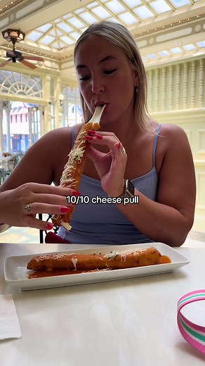 I mean a foot long mozz stick is crazzzzyyyy 10/10 🐭🎢🎡🎟️🍿☀️ @Disney Parks @Disney #magickingdom #disney #mozzarella #disneytok #foodie #fypシ゚viral #disneyworld #chilis #cheesepull #mozzarellasticks #review #disneyfood #disneyeats #disneysnacks #florida