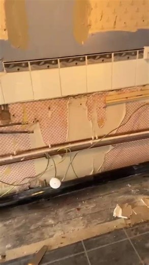 Fitting the new toilet waste pipe for the shower and toilet