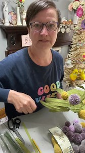 See how to create these adorable Pom Pom flowers using yarn and fabric. | The Crafty Decorator