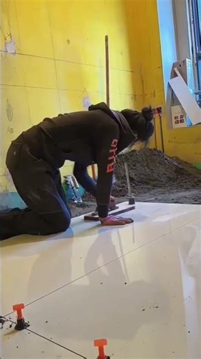Viral tutorial on leveling ceramic tiles using a trowel #viral #constructionchannel #wood
