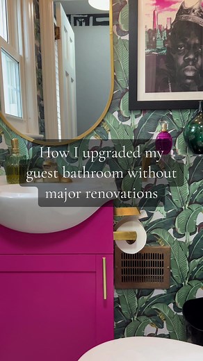 I completely transformed this small bathroom without any major renovations. Everything here is linked except for the Biggie art, it’s no longer available. #designtok #design #bathroomdecor #maximalism #foryou #upgrade #interior #makeover #wallpaper #fyp #designs
