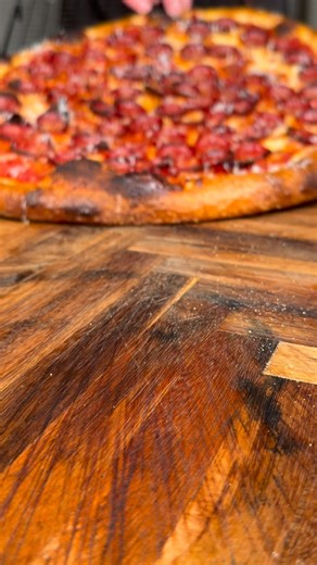 Sam on Instagram: "Go on, take a bite 🍕 Classic pep baked at home using my @itsdoughguy pizza steel and my regular oven. Baked at 550° for 7 minutes! Dough recipe pinned! Free Dough Calculator linked in bio or visit Doughguy.co 👨‍🍳 Tomatoes - @biancodinapolitomatoes Peppronis - @margheritameats Cheese - @traderjoes Happy baking!"