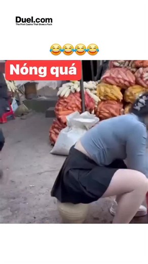 education.decodee on Instagram: "- The post shares a 12-second video depicting a dangerous prank in a Vietnamese market, where a man pours hot liquid from a pot under a squatting woman's skirt into a bucket, risking serious burns. - Captioned in Japanese as "Don't do unbelievable pranks," it has exploded to over 1.6 million views, drawing 100+ replies decrying the act as malicious and beyond acceptable mischief. - Likely staged given the visible filming setup, the clip fuels debates on prank eth