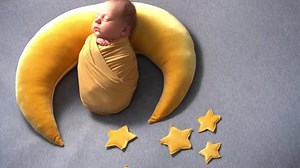 Newborn baby boy, little cute boy, baby in the moon