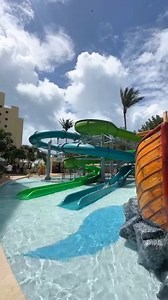 Discover our incredible new Aqua Park at #TheRoyalSands! It's the ultimate family experience where both young and old can enjoy unforgettable moments together. Dive down exhilarating slides, indulge in delicious treats at our Snack Shack, and immerse yourselves in a world of joy and adventure. 🌊🍔🎉 Join us and make memories that will last a lifetime! 📌 https://bit.ly/3KhUTZ5 --- ¡Te presentamos nuestro nuevo e increíble parque acuático en The Royal Sands! Grandes y pequeños se divertirán como