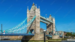 Hyperlapse view of Tower Bridge over River Thames an iconic symbol of London. Commuters and Traffic Passing by. Europe.