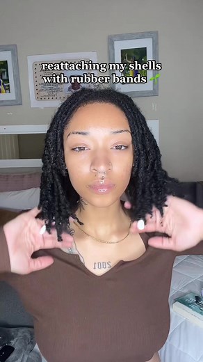 reattaching my shells with rubber bands ! •they were attached before with the rings that they came with. (Like regular hair jewelry) but over time the ring would get bent and every now and then my shell would fall out •is leaving rubber bands in your hair for too long bad for them? 😭 cuz if that’s the case I’ll revert back to the OG jewelry #girlswithlocs #oneyearlocd #starterlocs #shellsforlocs #locjewelry #blacklocs