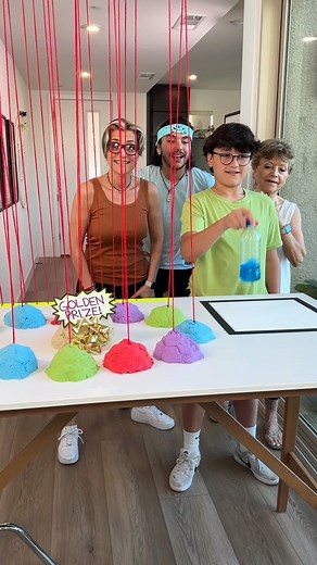 Hidden prizes in the sand 🤩#familychallenge #bottleflip #pullstring #vegastiktok