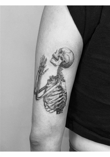 Quiet Prayer in Bone and Shadow Tattoo Art