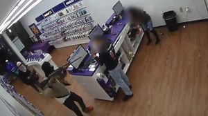Police searching for suspects in violent cell phone store robbery involving an AR-15