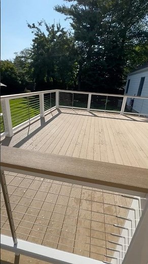 Azek Weathered Teak Deck. Timbertech Radiance Cable Railing #deck #deckbuilder #deckbuilding