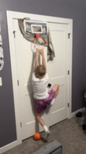 He’s weighs 61pounds get this Spalding mini hoop only at target