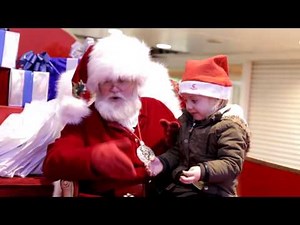 Santa signing to child