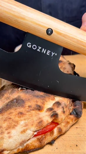 Sean Sullivan on Instagram: "I love a simple ham and cheese sandwich. This one with mozzarella and provolone, seasoned tomatoes, and lots of mayo on pizza dough really brings me back to my childhood. Baked in my @gozney arc xl #hamsandwich #pizzalover #pizza"