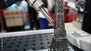 Explore the exquisite craftsmanship of a detailed Eiffel Tower model, designed for enthusiasts. Media