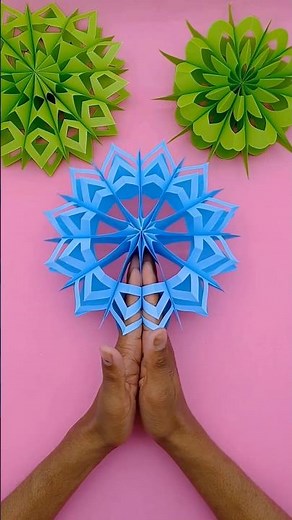 Just one sheet of paper + scissors = a beautiful snowflake design! ✂️❄️