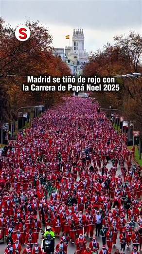 SIN CODIGO on Instagram: "🎅Madrid se tiñó de rojo con la Carrera de Papá Noel 2025 Miles de corredores vestidos como Papá Noel participaron de la tradicional Carrera de Papá Noel 2025, recorriendo cinco kilómetros por el emblemático Paseo de la Castellana. El evento solidario volvió a reunir a familias, atletas y aficionados en una jornada festiva marcada por el espíritu navideño. La iniciativa tuvo un fin benéfico: todo lo recaudado será destinado al proyecto “Primera Infancia” de Cruz Roja, q