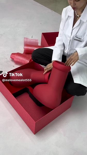 Customizing Black Boots with Unique Red Design