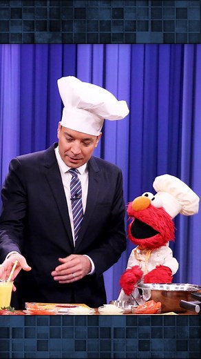 The Tonight Show on Instagram: "@elmo teaches Jimmy, @questlove, and Jason Schwartzman how to make a Sloppy Oscar! #FallonFlashback"