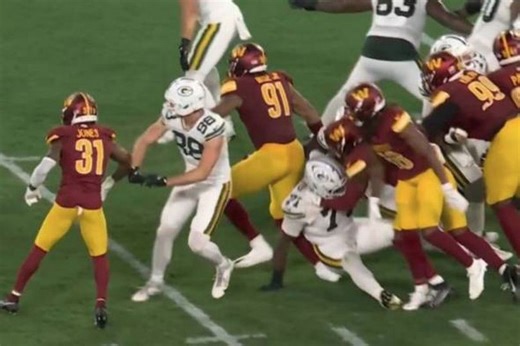 Horror NFL injury sees Lambeau Field fall silent as Commanders star carted off