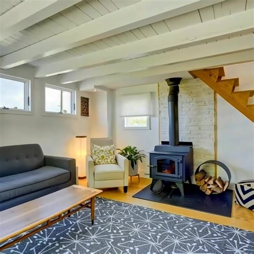 CHINCOTEAGUE WATERVIEW LISTING! Charming Bay View Retreat with Guest Cottage! The best of coastal living with this beautifully remodeled home... thoughtfully designed with style, this energy efficient 1,058 sq ft home blends natural materials with modern updates to create a very inviting space. Step inside to see exposed beams, hardwood floors throughout, and abundant natural light that fills every room with warmth. The layout offers additional rooms perfect for yoga, art, hobbies, or guests. Ou